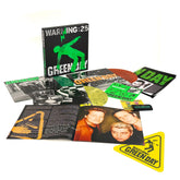 Warning (25th anniversary Deluxe edition) - LP BOX Exclusiva (5LP Color Verde, Amarillo y Naranja + Libreto + Parche + Póster + Botones + Pegatina "Warning")